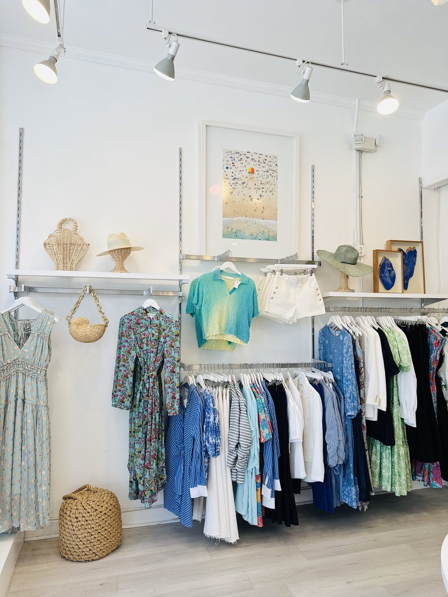 Clothing Boutique Wall Standards, White Hangers, and Faceouts